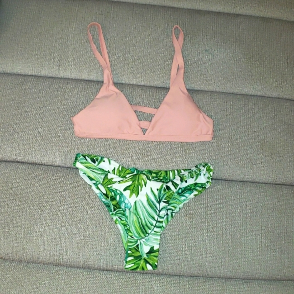 Bikini. New. Pink top, white with green leaves. Size S.